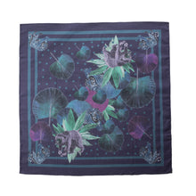 Load image into Gallery viewer, Square scarf in a blue colour with two contrasting blue lines framing the image, polkadots, a tiger and sun bear in blue, grey and black colours, and leaves in green and purple shades.
